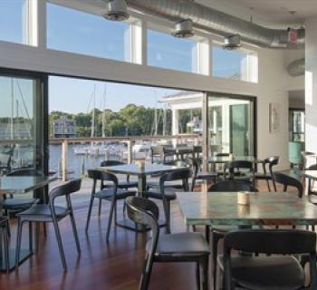 Interior view of waterfront dining room. Photo